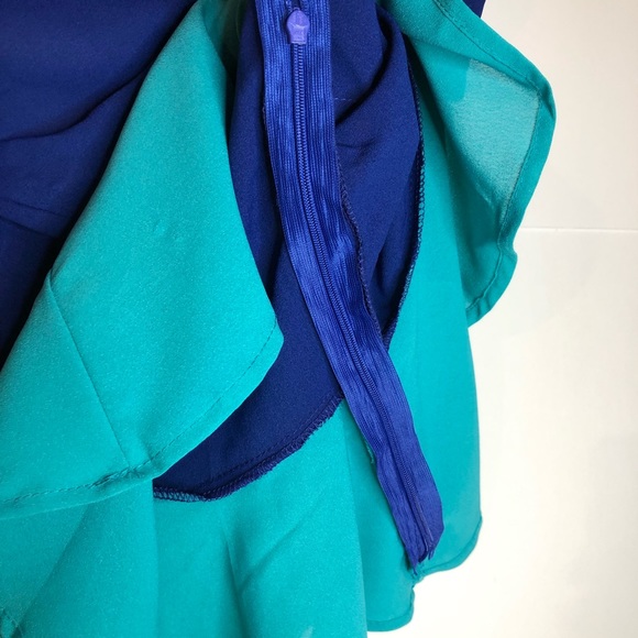 Peplum Shirt with Cut-Out Back - Picture 2 of 12